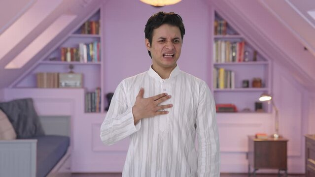 Sick Indian man having acidity attack