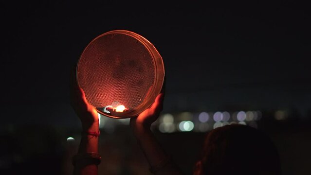 Karwa Chauth strainer and Diya oil lamps for the Karwa Chauth celebration on the night