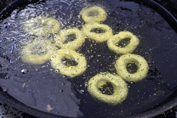 Frying donuts on the street
