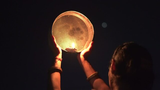 Karwa Chauth strainer and Diya oil lamps for the Karwa Chauth celebration on the night