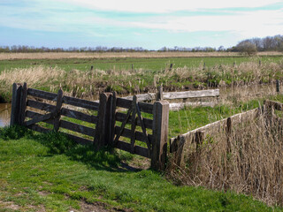 Fototapeta na wymiar Weathered Gateway: A Rustic Countryside Entry