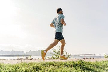 Routine training development of the cardiac system. Warm-up runner happy uses sportswear.  A hardy...