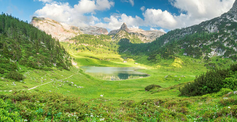 Fototapeta na wymiar Bavarian hiking nature landscape with lake and scenic mountain background