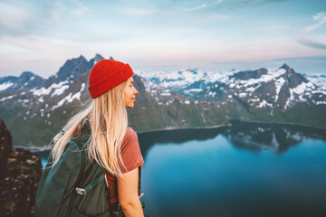 Woman hiker exploring Norway with backpack active healthy lifestyle mountains adventures travel...