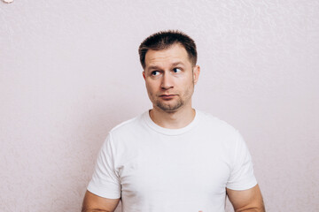 Portrait of men in a white t -shirt
