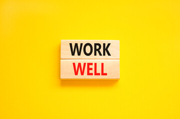 Work well symbol. Concept words Work well on beautiful wooden block. Beautiful yellow table yellow background. Business marketing, motivational work well concept. Copy space.