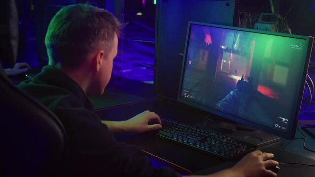 Player Victorious Against Terrorist Enemies In Modern Computer Game Digital Entertainment. Player Wins In Entertaining Shooter Video Game. Player Gaming On Pc For Entertainment. Military Simulator