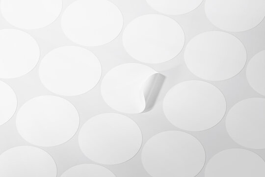 Round stickers on the sheet mockup. 3D rendering