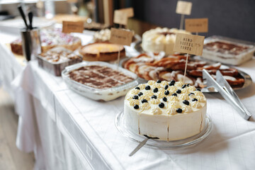 Delicious cake and dessert buffet at a wedding reception
