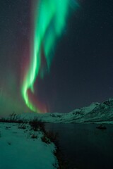 Rare red northern lights, Red Aurora Borealis. High quality photo - 661847752