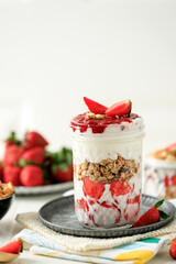 Strawberry Yogurt Parfait with Granola, Mint and fresh Berries