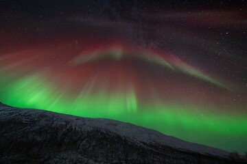 Rare red northern lights, Red Aurora Borealis. High quality photo - 661848127