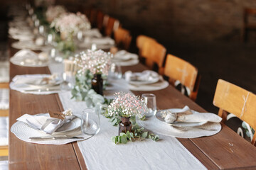 Beautiful table decoration at barn wedding