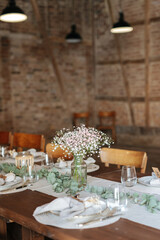 Beautiful table decoration at barn wedding
