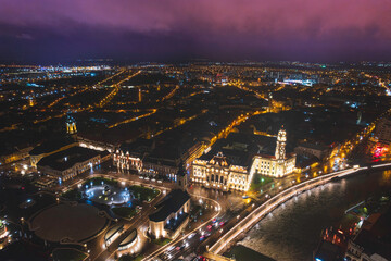 Oradea romania tourism aerial a breathtaking night skyline of a historic European city, showcasing...
