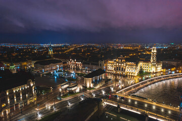 Oradea romania tourism aerial a vibrant cityscape illuminated at night showcasing its historic...