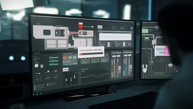 Engineer using modern software to control the automatic production process. Engineering software monitoring the automatic conveyor belt. Automatic engineer software supervising the caps manufacturing.