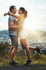 Love, hiking or happy couple hug in nature on outdoor date for care with support, loyalty or trust in park. Romantic man, wellness or woman on holiday vacation together to celebrate, relax or smile
