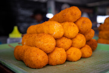Breaded chicken nuggets at street food market