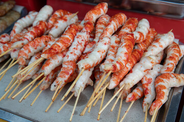 Explore a variety of delicious foods sold at the stalls in the night market