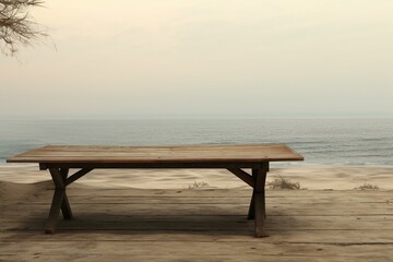 Fototapeta na wymiar A vacant wooden brown table surrounded by a hazy background of a beachside retreat. Generative AI