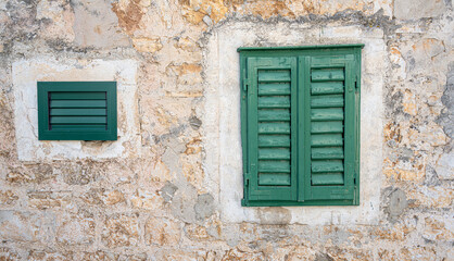 Fototapeta na wymiar Old window in Mediterranean architecture.