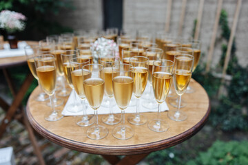 Glasses filled with sparkling wine at a wedding