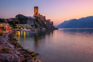Gordijnen Malcesine town on Lake Garda, Italy, on dramatic sunset © Boris Stroujko