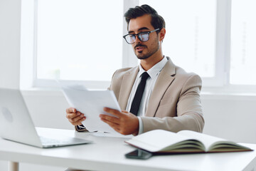 Holding paper laptop office businessman planning