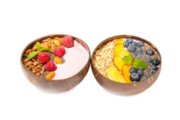 Bowl of granola with yogurt and fresh almonds, blueberries, raspberries,peach and strawberries isolated on white background. Healthy food. balanced breakfast.