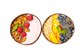 Bowl of granola with yogurt and fresh almonds, blueberries, raspberries,peach and strawberries isolated on white background. Healthy food. balanced breakfast.