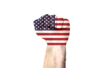 American flag on a clenched male fist. USA Flag on fist on the white background - concept of the strongest and most powerful country in the world, both militarily and economically