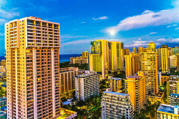 Fototapeta na wymiar Colorful Early Morning Buildings Moon Waikiki Honolulu Hawaii