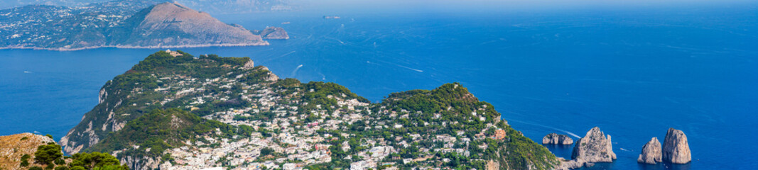Fototapeta na wymiar Panoramic views of Capri and a Bay of Naples in Italy
