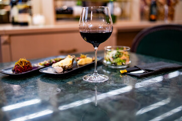 Obraz na płótnie Canvas tasting set appetizer food and red wine glass