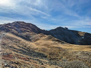 Beautiful autumn hike to the Jakobshorn above Davos Klosters Mountains. Mountaineering in the Swiss Alps Grison. High quality photo