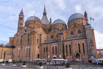 Padua, Italy - January 22 2023 - Tourists visiting the Ancient Roman Entrance Arc. The Piazzetta Castelvecchio
