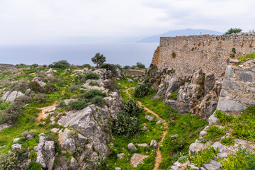 Fototapeta premium Nafplion, Greece - 14 February 2023 - The Fortress of Palamidi rising above Nafplion on the Peninsula of Greece