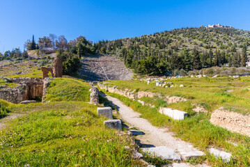 Argos, Greece - 19 February 2023 - The old ruins of the ancient theater of Argos. Old archeological...