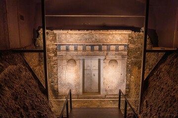 Aegae, Greece - 19 March 2023 -Recovered entrance of the royal tomb at the Museum of the Royal Tombs at Aigai (Aegae) - obrazy, fototapety, plakaty