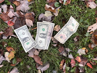 last money on wooden table financial well-being poor people