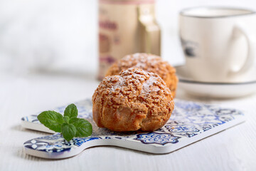 Choux cakes with custard.