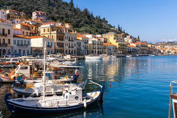 Githion, Greece - 12 February 2023 - Fishing boats wainting to sail out in the harbour of town - obrazy, fototapety, plakaty