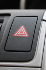 Car Hazard lights button used to alert motorists of a hazard