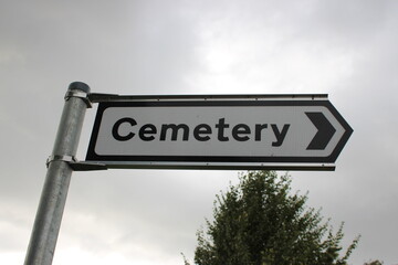 Fototapeta premium Cemetery road sign taken on a cloudy summers afternoon UK