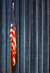 USA national flag in front of stage curtain