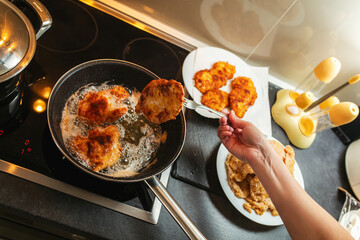 Close-up of making schnitzel