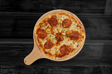 Top view of Homemade Pizza Pepperoni
 on wood table background
