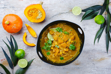 Traditional Indian vegetarian curry stew with sweet potatoes and as top view in saucepan