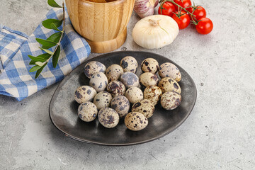 Raw quail eggs in the bowl